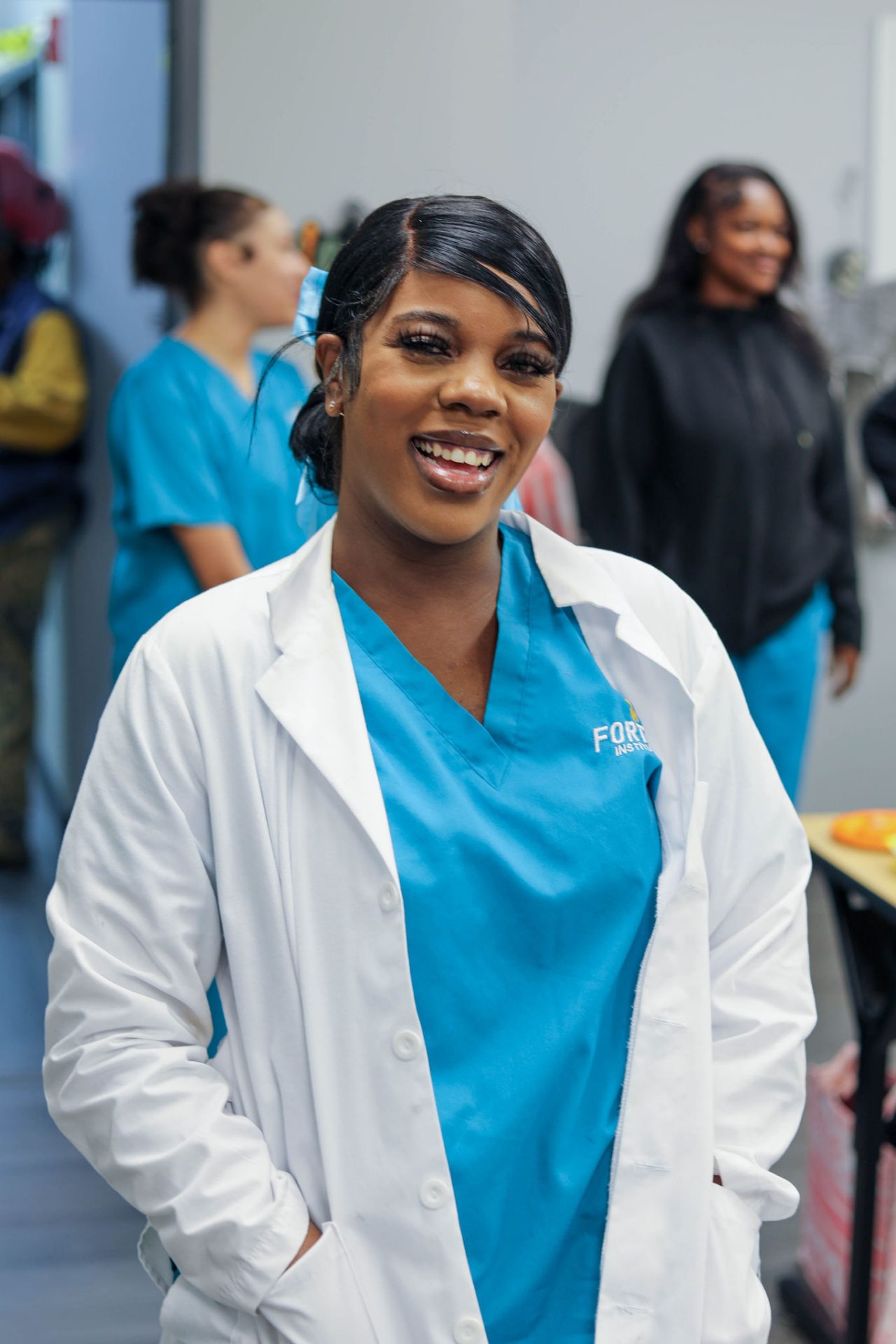 Young female nurse with elderly female